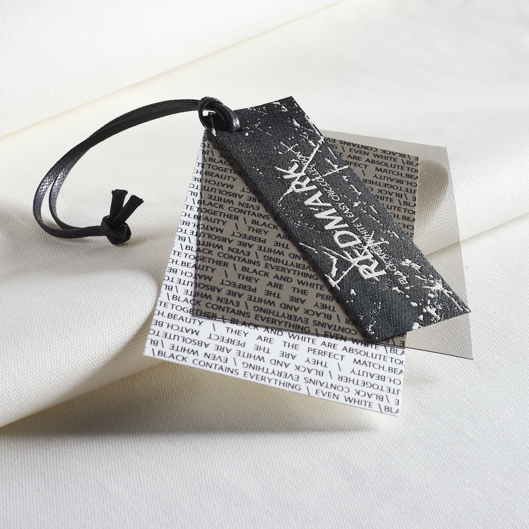 Detail of a tailoring label with different materials